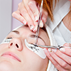 Tweezers used to seperate the lashes during a cosmetic procedure